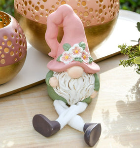 Gnome zittend roze